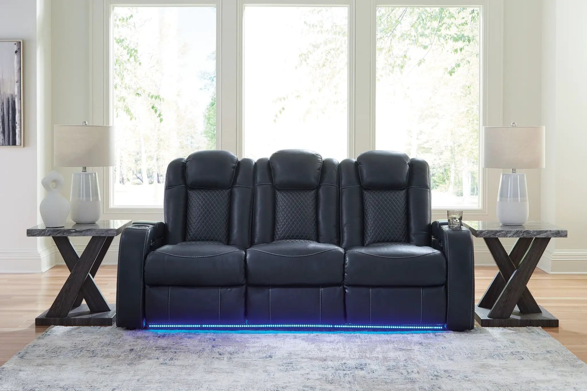 Fyne-dyme power reclining sofa with headrest in black leather by Unique Piece on Tampa Home & Garden Store