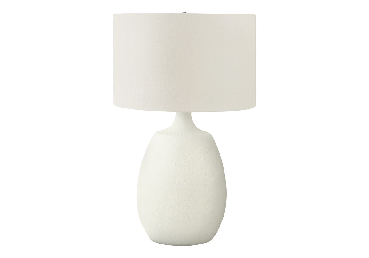 Table lamp with cream resin base and cream fabric shade in contemporary style on Tampa Home & Garden Store