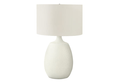 Table lamp with cream resin base and cream fabric shade in contemporary style on Tampa Home & Garden Store