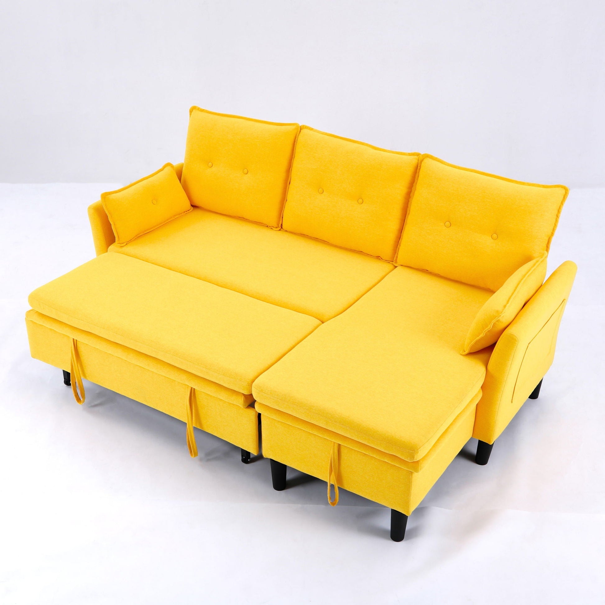Yellow fabric L-shaped reversible chaise sectional with storage ottomans and black legs on Tampa Home & Garden Store