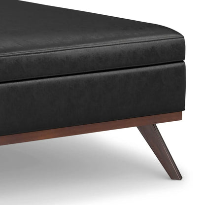 Owen storage ottoman in black faux leather with wood legs Unique Piece on Tampa Home & Garden Store