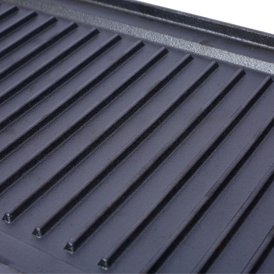 Pre Seasoned cast iron reversible rectangular grill griddle in black with ridged surface on Tampa Home & Garden Store