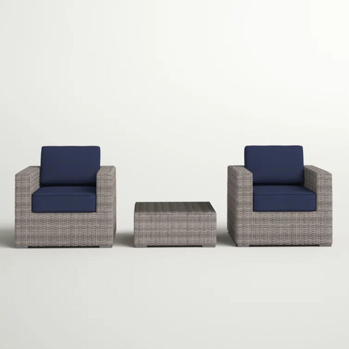 3 Piece outdoor seating set; light brown wicker chairs, navy cushions, square coffee table on Tampa Home & Garden Store