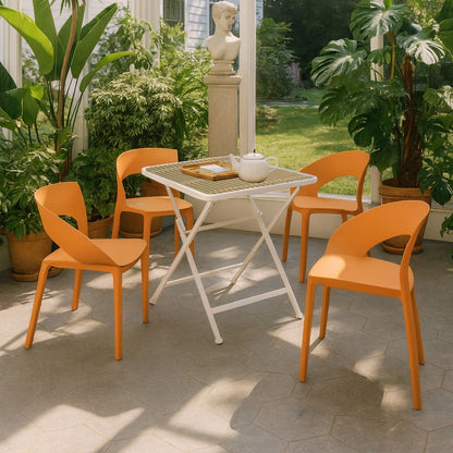 Modern 5-piece outdoor dining set with folding white table and orange chairs on Tampa Home & Garden Store