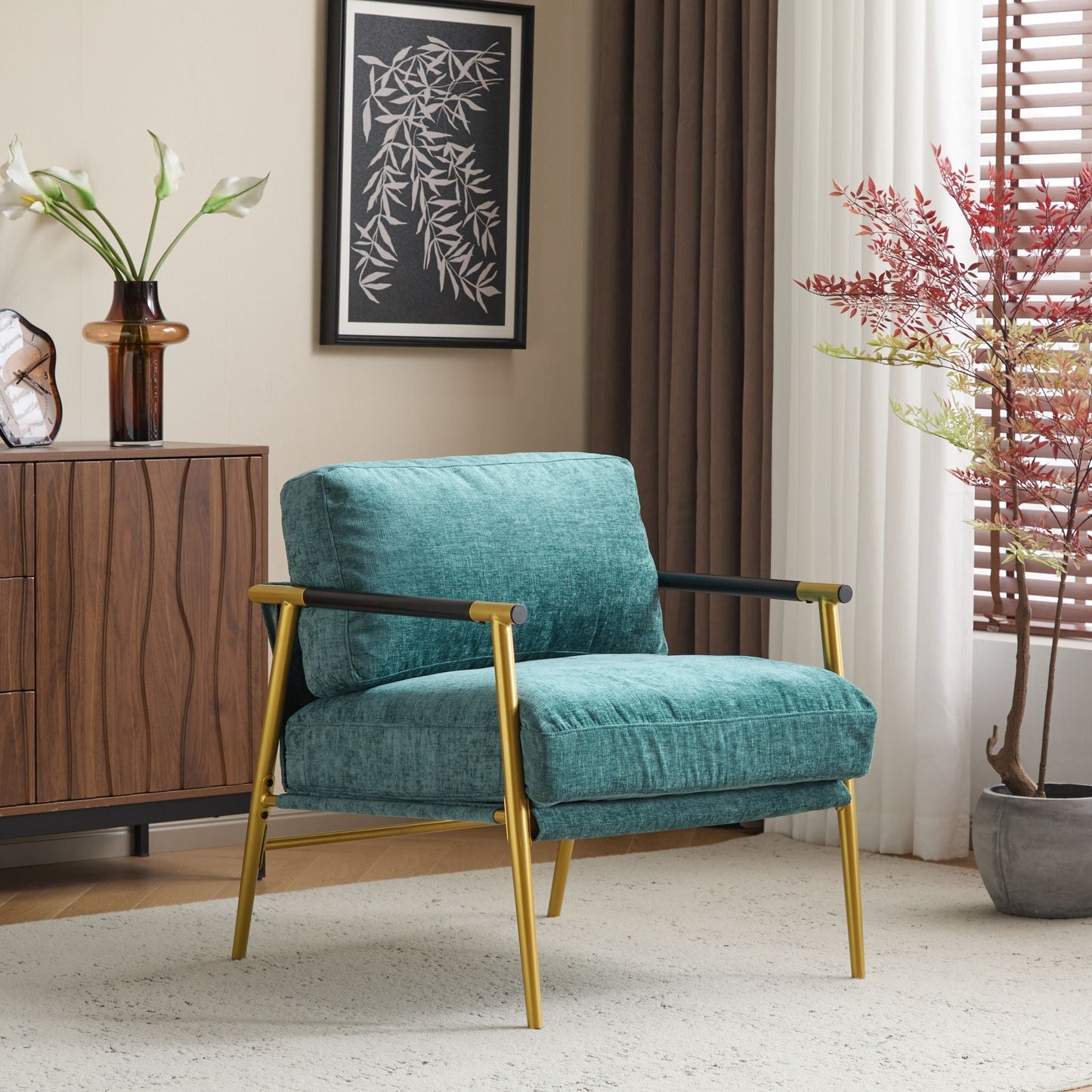 Modern accent chair with plush teal cushions and gold-tone metal frame on Tampa Home & Garden Store