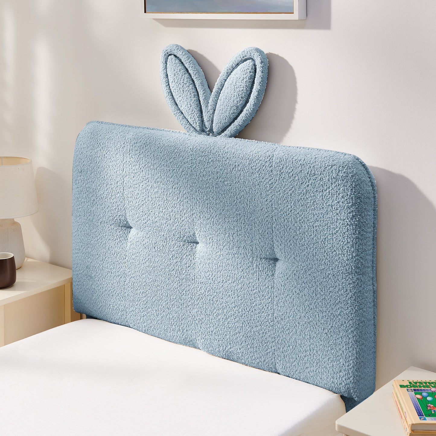Twin size kids upholstered bed with oversized rabbit-ear headboard in light blue fabric on Tampa Home & Garden Store
