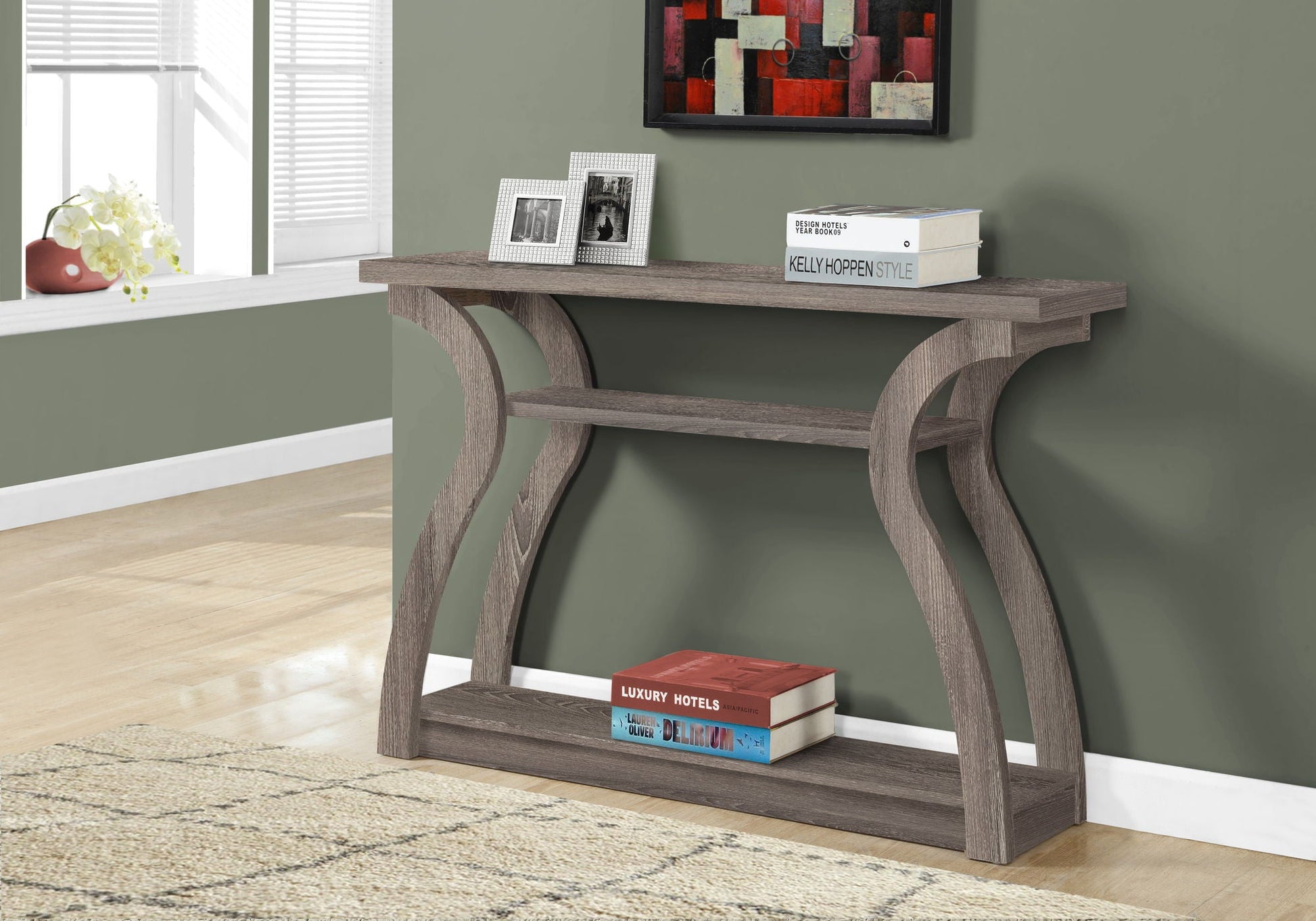 Accent Console Table for Entryway with unique curved wood legs and two silver photo frames on Tampa Home & Garden Store