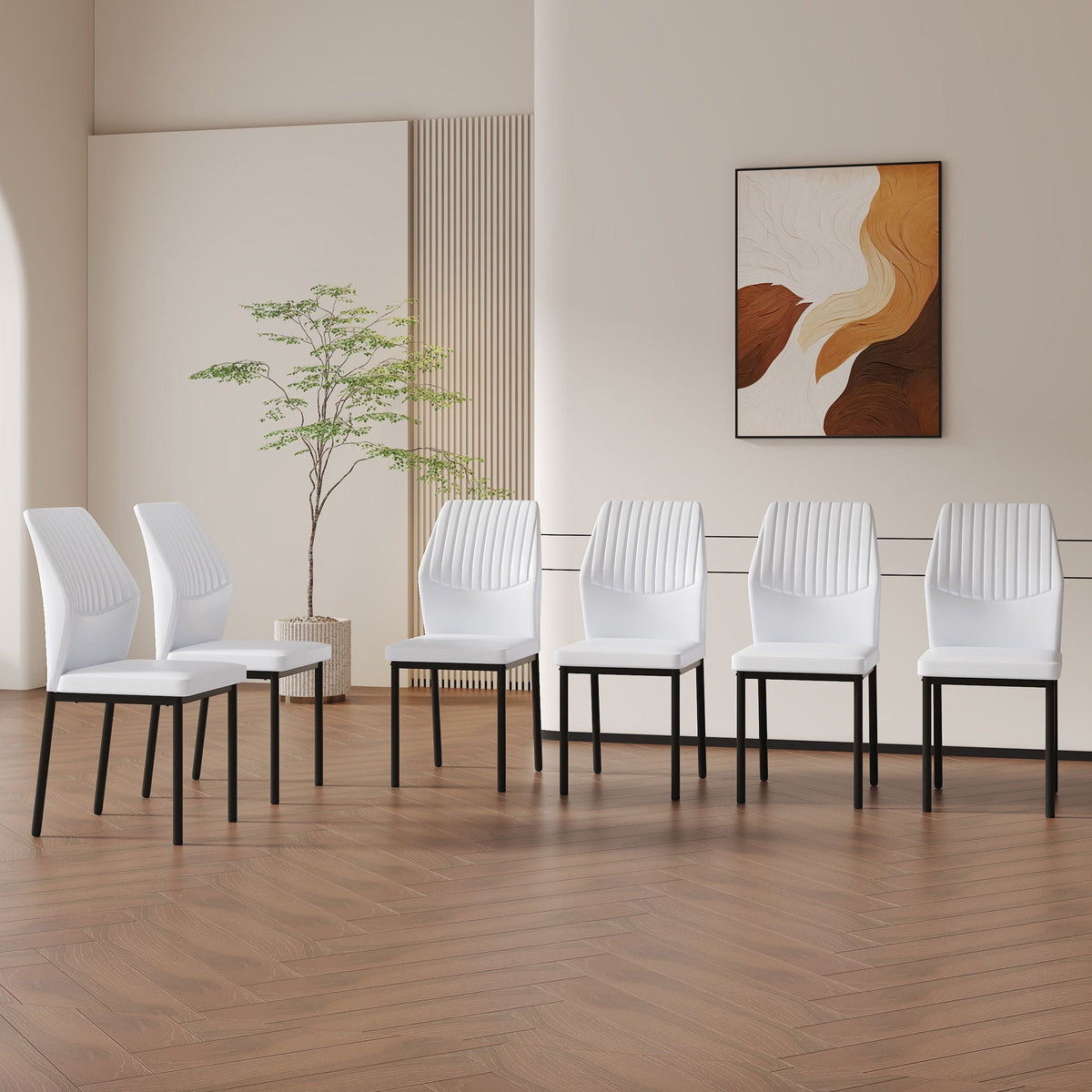 Ergonomic Simple Chair With Metal Leg set: white chairs with black legs in a modern room on Tampa Home & Garden Store