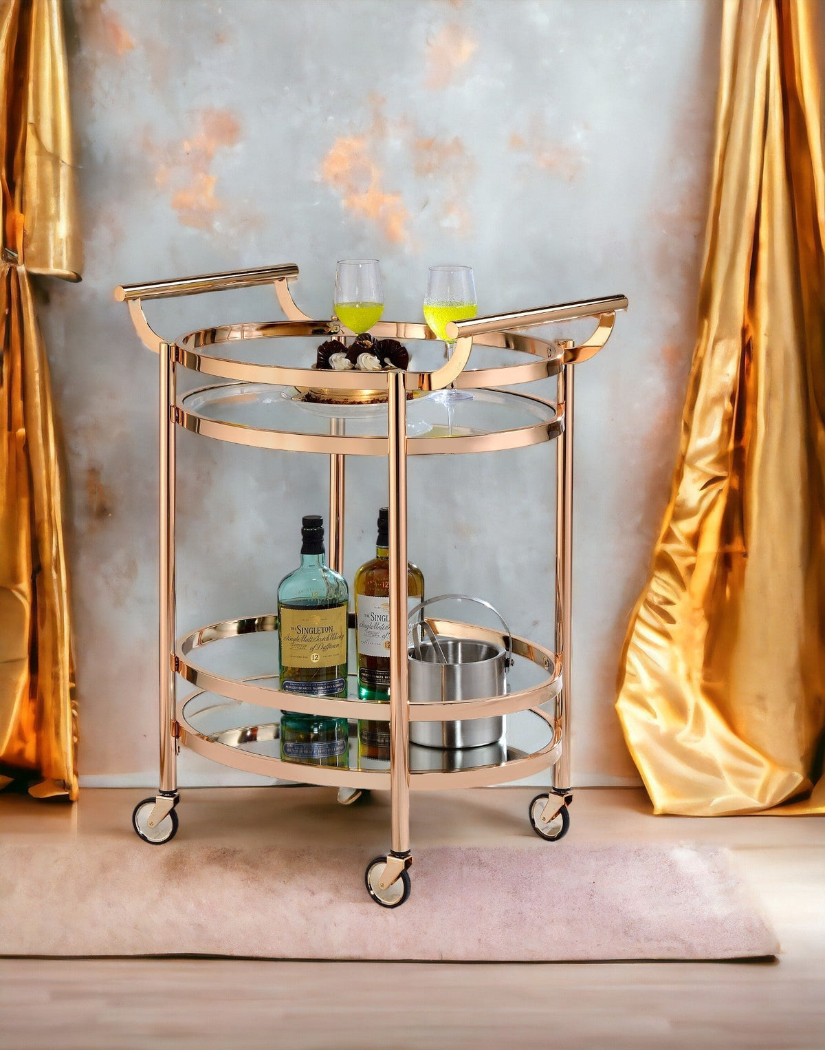 Lakelyn Clear Glass & Rose Gold Serving Cart with glass shelves and wheels on Tampa Home & Garden Store