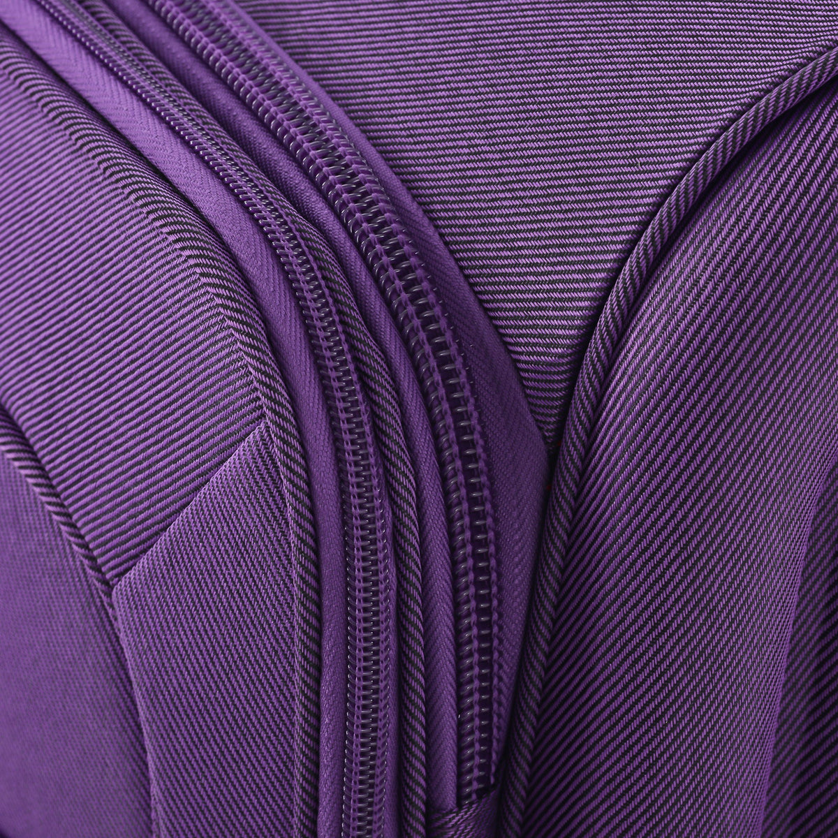 Purple softside luggage fabric close-up with zippers HouseOfZazla 3-piece travel set on Tampa Home & Garden Store