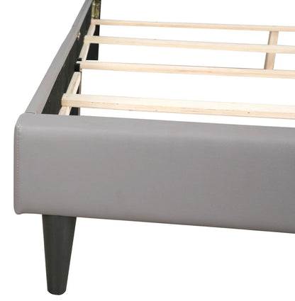 Button Tufted Upholstered Bed in gray faux leather with light wood slats and dark tapered legs on Tampa Home & Garden Store