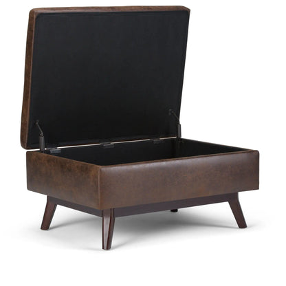Owen upholstered rectangular storage ottoman in brown leather with wood legs and lid open, black interior on Tampa Home & Garden Store
