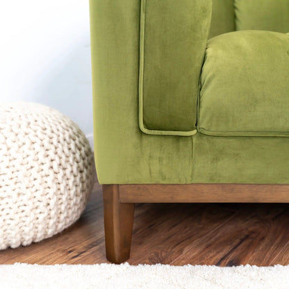 Melissa midcentury sofa olive green upholstery with wooden tapered leg beige pouf on Tampa Home & Garden Store