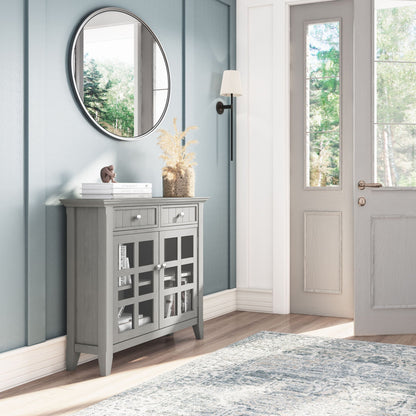Acadian Handcrafted Entryway Storage Cabinet in graywashed wood with glass doors and drawers on Tampa Home & Garden Store