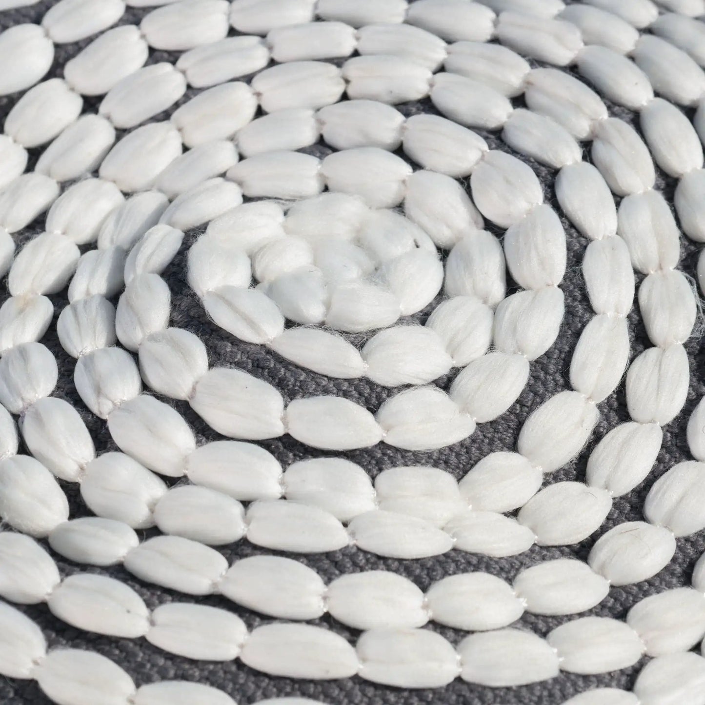 River Handcrafted cylindrical pouf water resistant fabric white fibers on dark weave base on Tampa Home & Garden Store