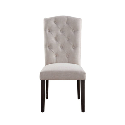 Beige linen tufted dining chair with padded seat and diamond button tufting; dark wood legs on Tampa Home & Garden Store