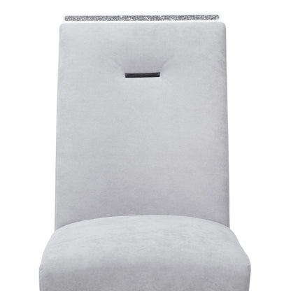 Ariya dining chair in light gray textured fabric with crystal top rail by Unique Piece Furniture on Tampa Home & Garden Store