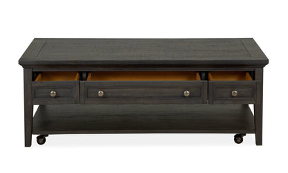 Westley Falls cocktail table with casters graphite finish, three drawers on Tampa Home & Garden Store