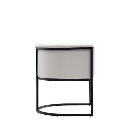Cosmopolitan Dining Chair with geometric black metal frame and white upholstered seat on Tampa Home & Garden Store