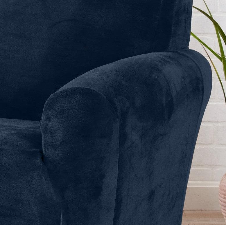 Velvet stretch slipcover Gale Collection in navy blue on sofa arm by Great Bay Home on Tampa Home & Garden Store