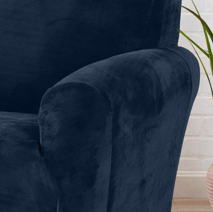 Velvet stretch slipcover Gale Collection in navy blue on sofa arm by Great Bay Home on Tampa Home & Garden Store