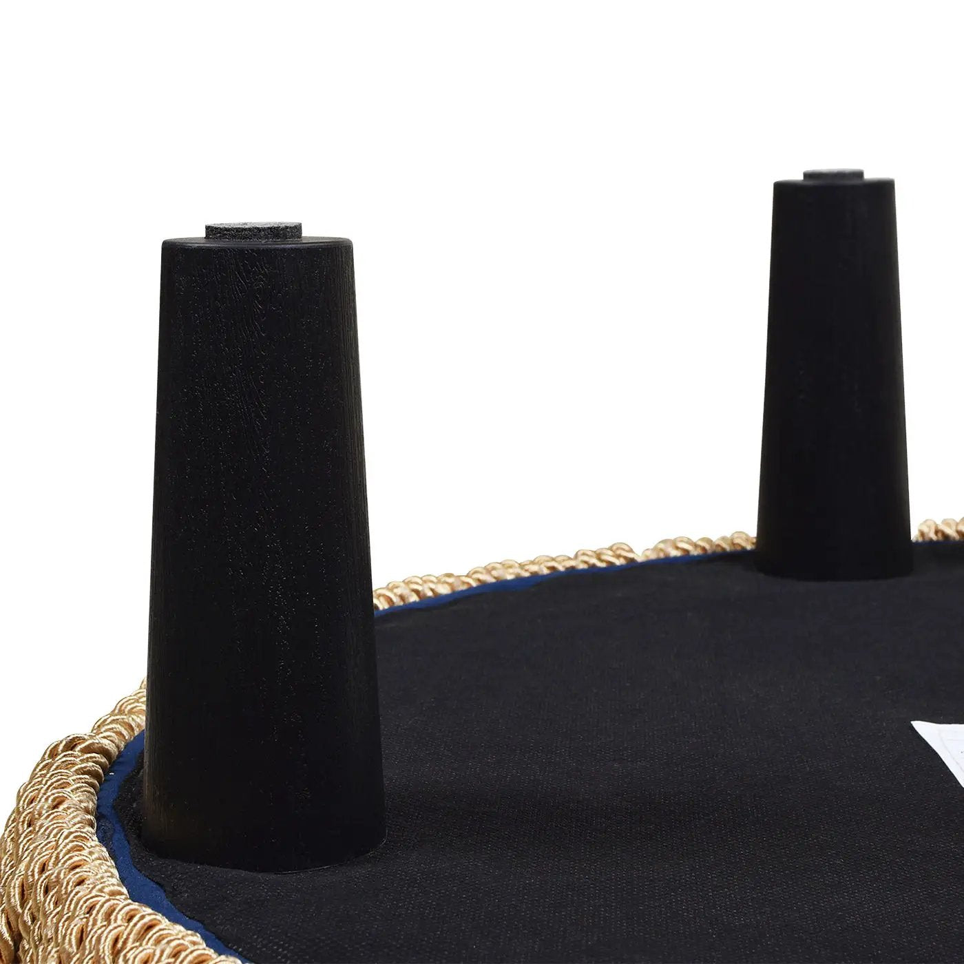 Yolanda round upholstered ottoman in black fabric with black wood legs and gold trim on Tampa Home & Garden Store