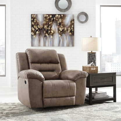 Stoneland rocker recliner in brown leather with plush cushions by Unique Piece Furniture on Tampa Home & Garden Store