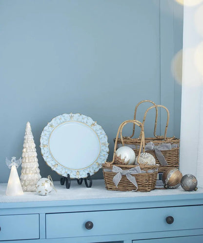 Christmas ball ornaments by Unique Piece Furniture in white and gold on a blue dresser on Tampa Home & Garden Store