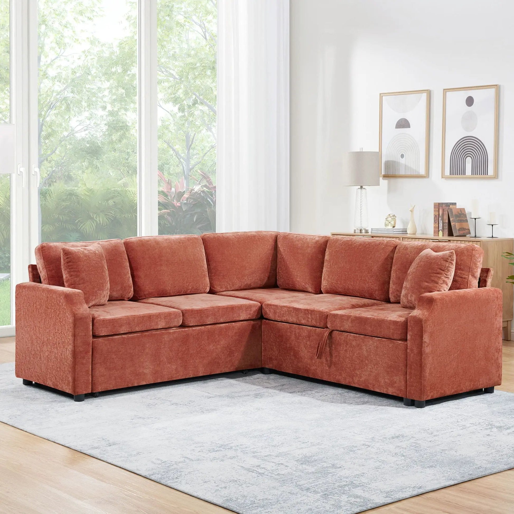 Modern L-shaped sleeper sectional in burnt orange velvet with hidden storage in living room on Tampa Home & Garden Store