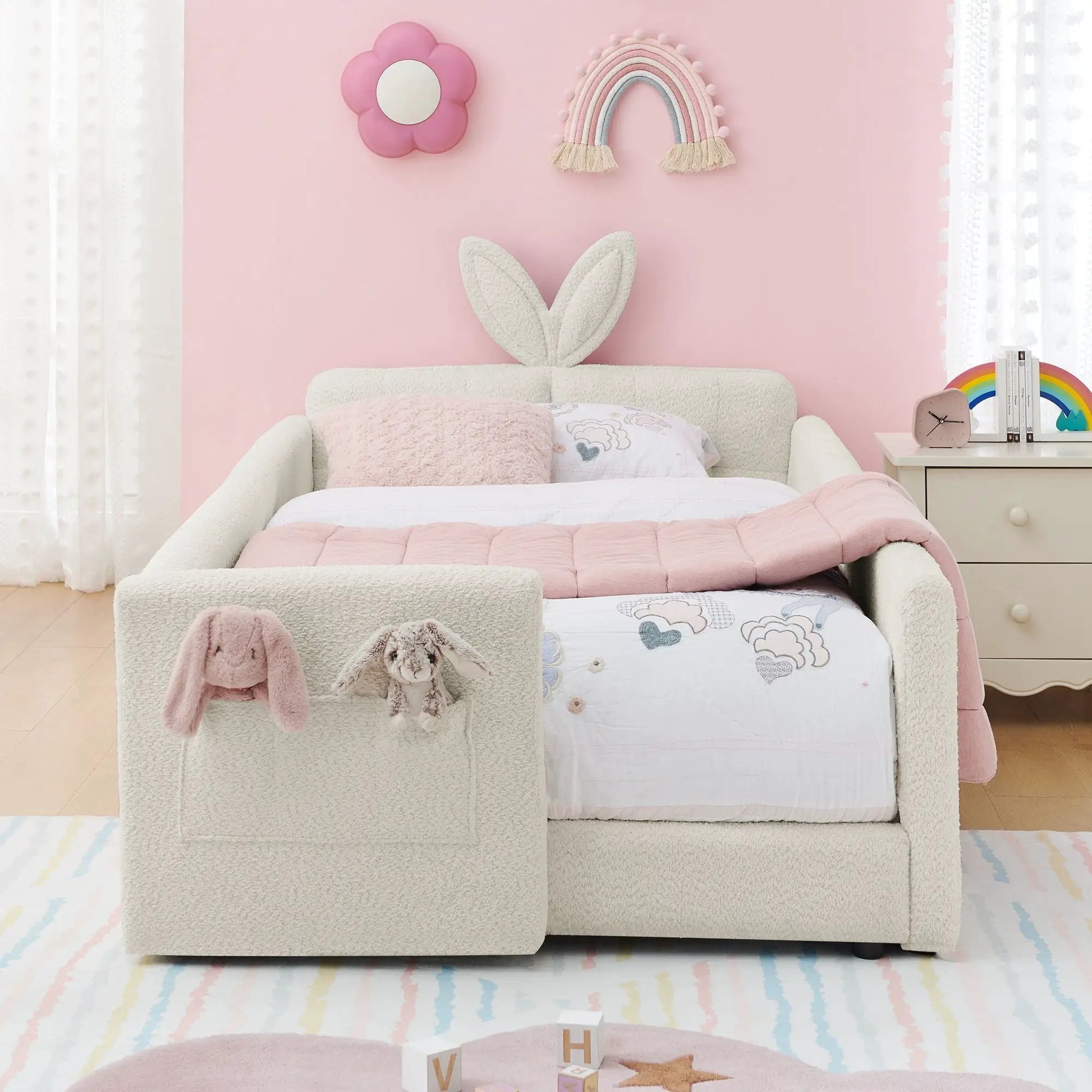 Cute rabbit-ear upholstered platform bed frame with safety rail in ivory boucle on Tampa Home & Garden Store