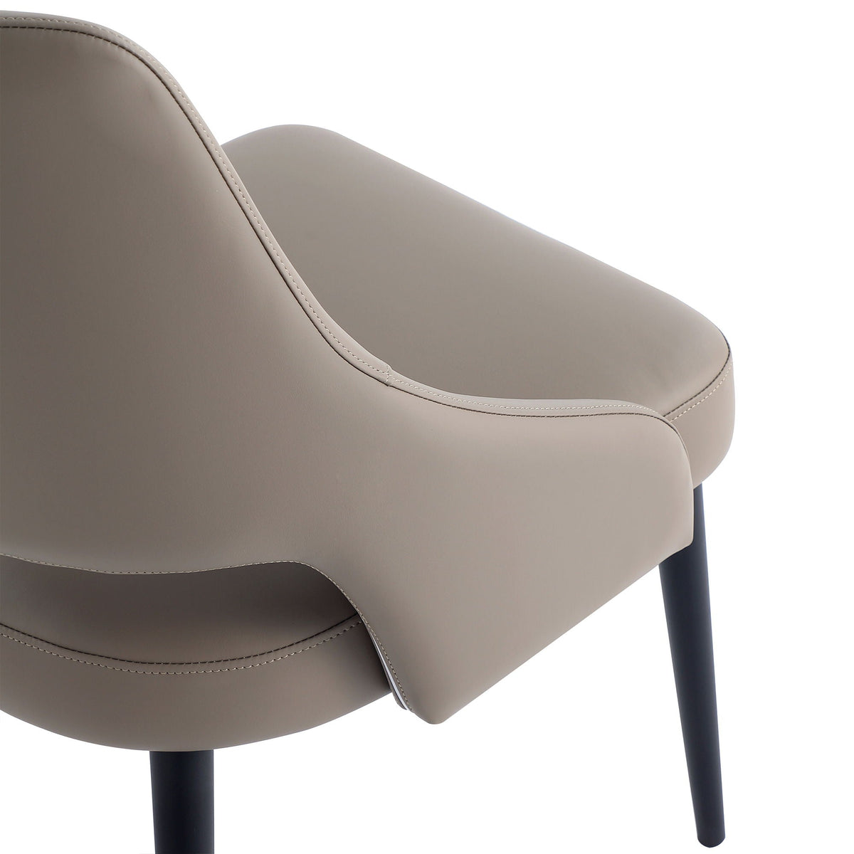 Tremont dining chair by HouseOfZazla with steel frame and taupe leather upholstery on Tampa Home & Garden Store