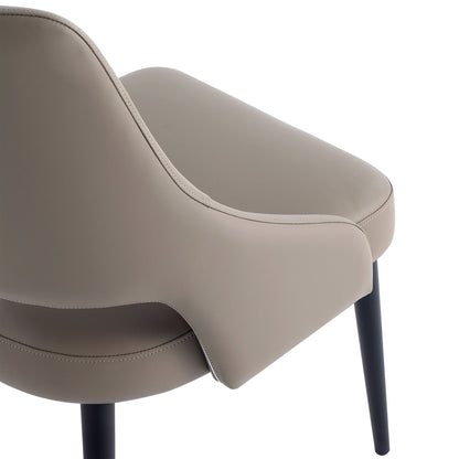 Tremont dining chair by HouseOfZazla with steel frame and taupe leather upholstery on Tampa Home & Garden Store