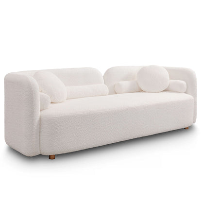 Modern Three Seater Couch And Fluffy Pillows