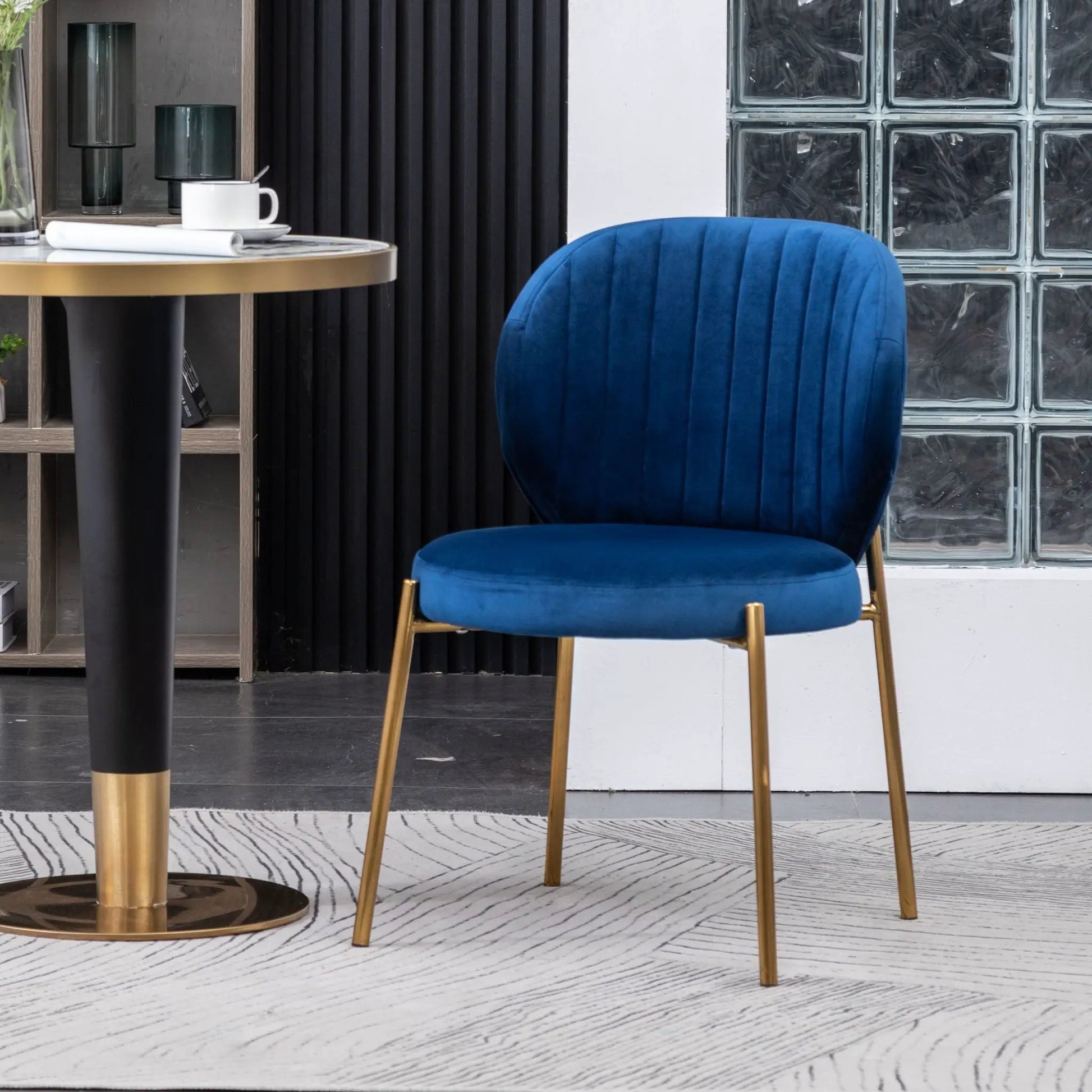 Amoa blue velvet dining chair by Unique Piece Furniture with gold legs on Tampa Home & Garden Store