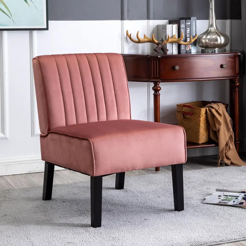 Mid-Century pink velvet accent chair with vertical channel tufting and black legs on Tampa Home & Garden Store