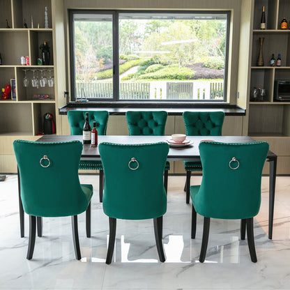 Tufted Dining Chair Set in teal velvet with nailhead trim around a dark table; chairs visible on Tampa Home & Garden Store