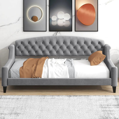 Modern Tufted Button Daybed in gray upholstery with orange accent pillows on Tampa Home & Garden Store