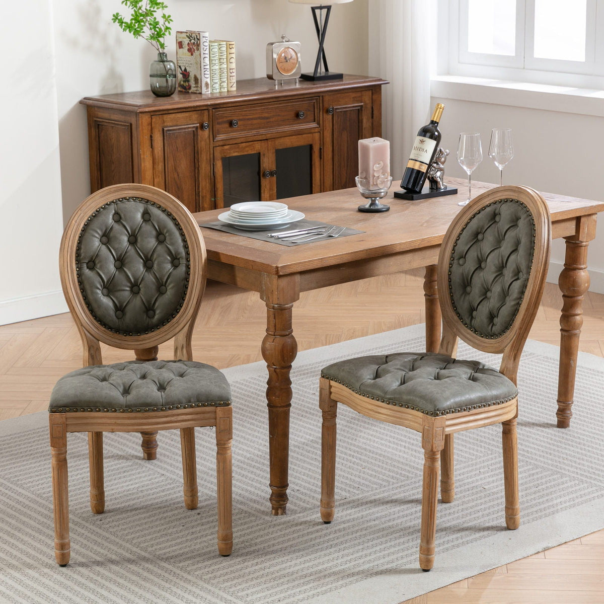 French Style solid wood dining chairs with nailhead trim, gray-green tufted upholstery on Tampa Home & Garden Store