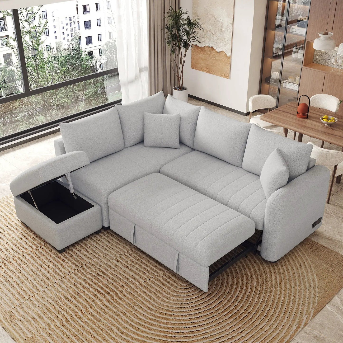 L-shaped sleeper sectional in light gray fabric with movable storage ottoman on Tampa Home & Garden Store