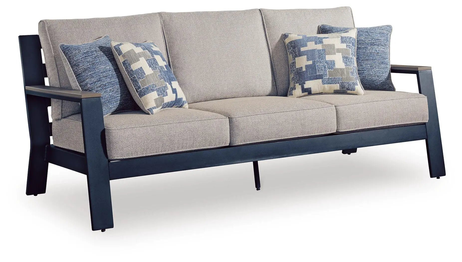 East Beach sofa with beige upholstery and dark navy frame, blue patterned cushions on Tampa Home & Garden Store