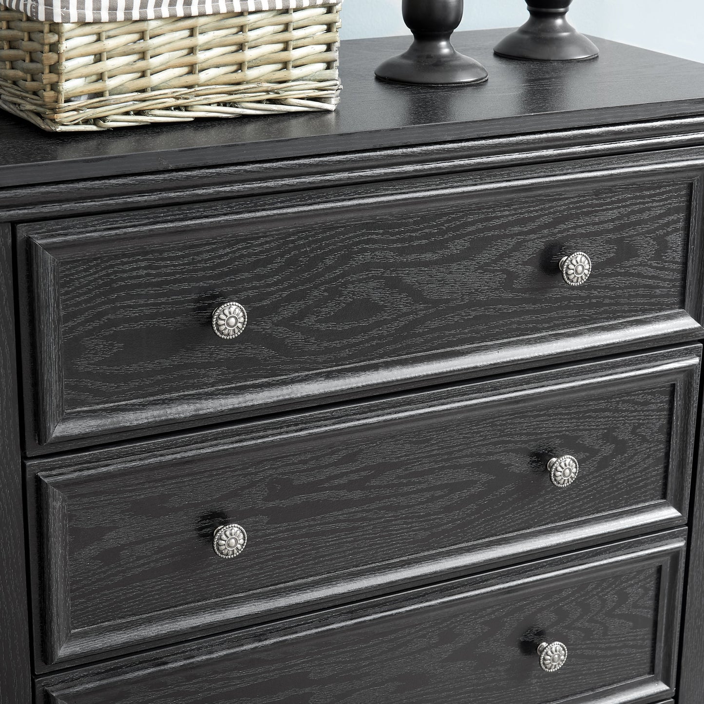 Modern 5-drawer black dresser with decorative rosette knobs on Tampa Home & Garden Store