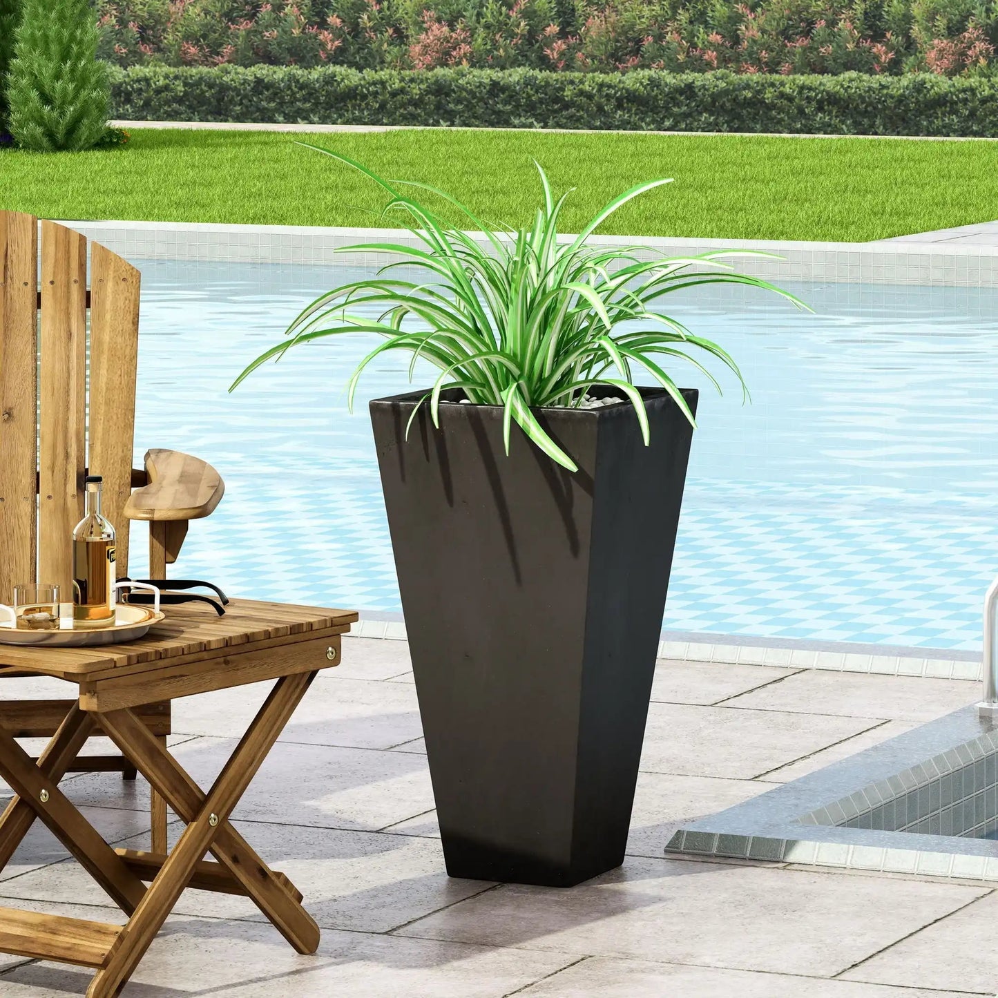 Outdoor Modern Cast Stone Planter in dark charcoal finish with a variegated spider plant on Tampa Home & Garden Store