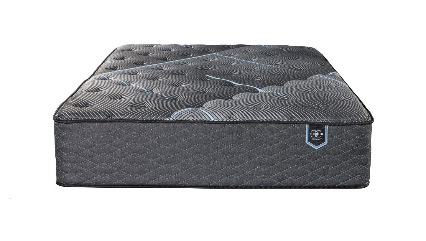 Full Restonic ComfortCare Hybrid plush mattress with dark gray cover and blue piping Restonic on Tampa Home & Garden Store