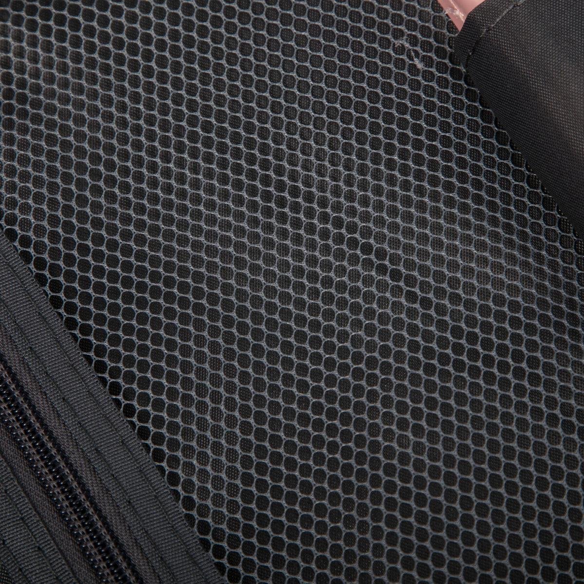 HouseOfZazla luggage interior lining with dark hexagonal mesh fabric on Tampa Home & Garden Store