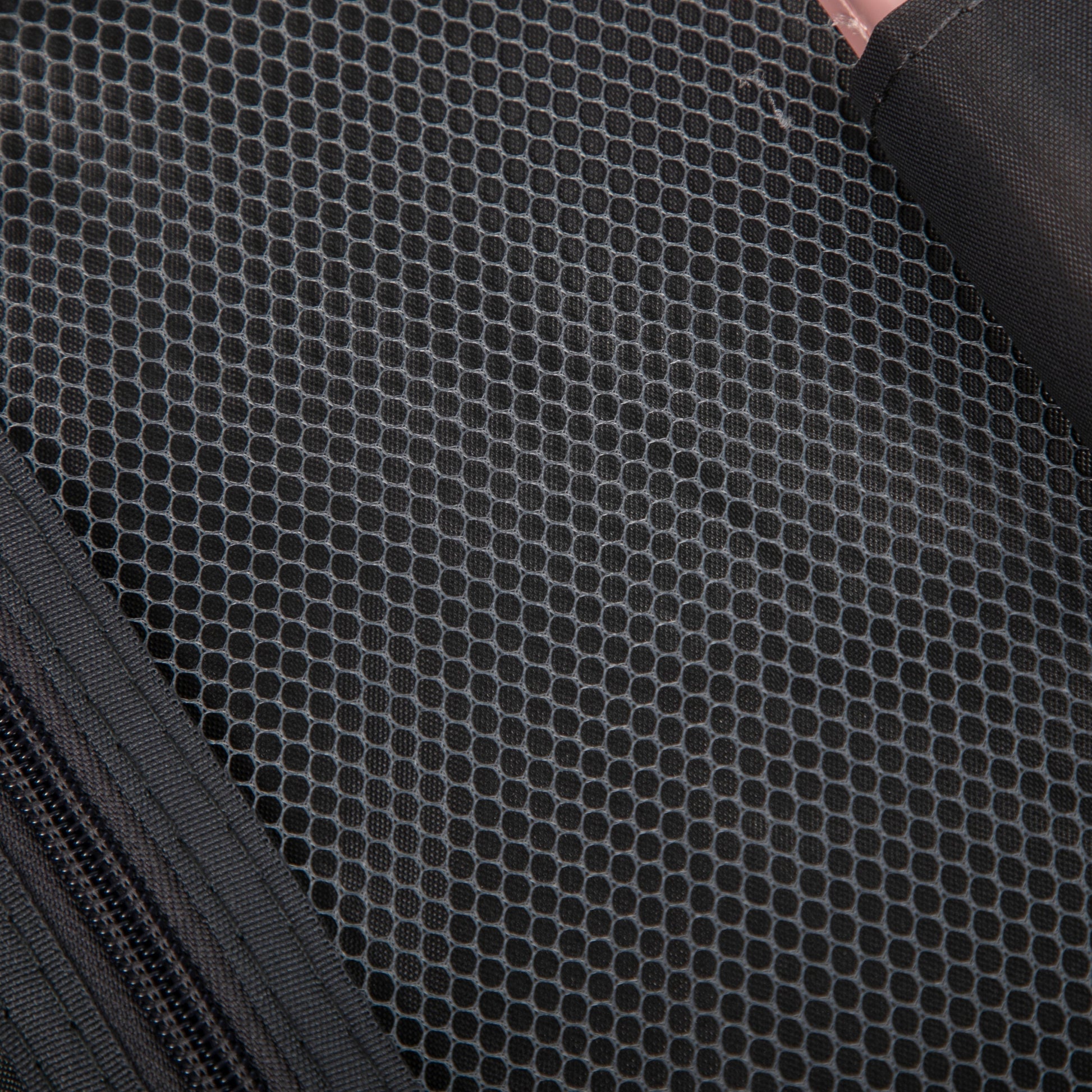 HouseOfZazla luggage interior lining with dark hexagonal mesh fabric on Tampa Home & Garden Store