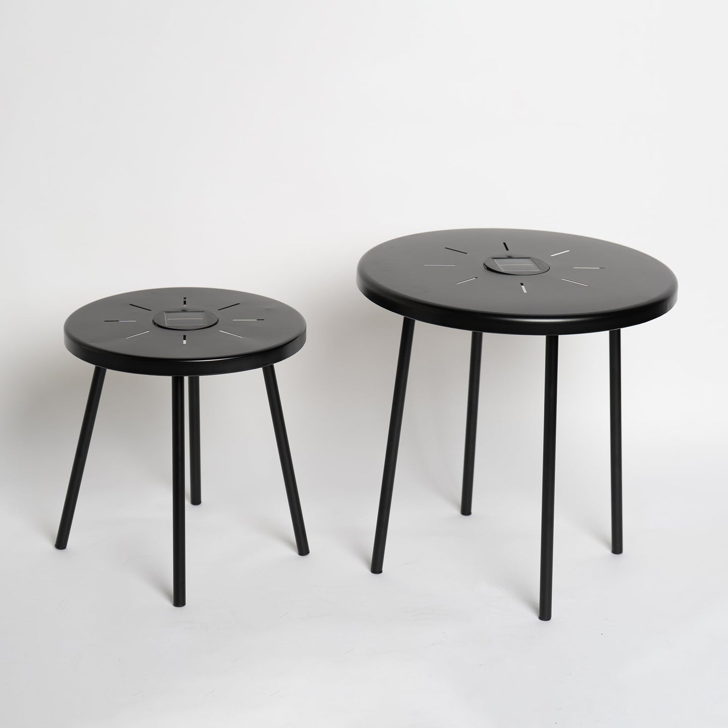 a Set of Two Solar Led Nesting Round Side Tables