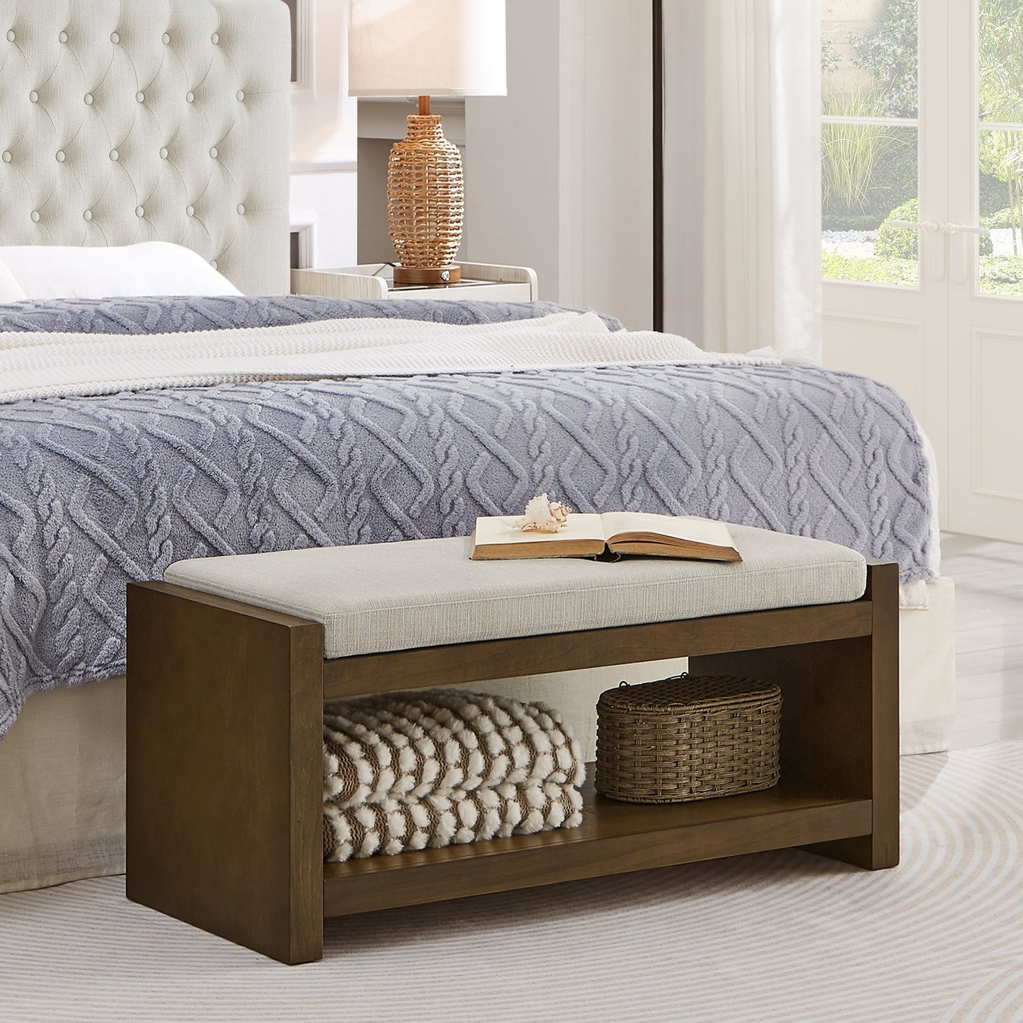 40-inch accent bench with lower shelf storage baskets, dark wood base and beige cushion on Tampa Home & Garden Store