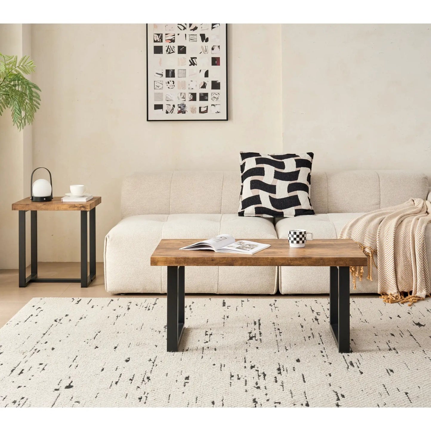 Two wood-top coffee tables with black metal legs in a living room by Unique Piece Furniture on Tampa Home & Garden Store