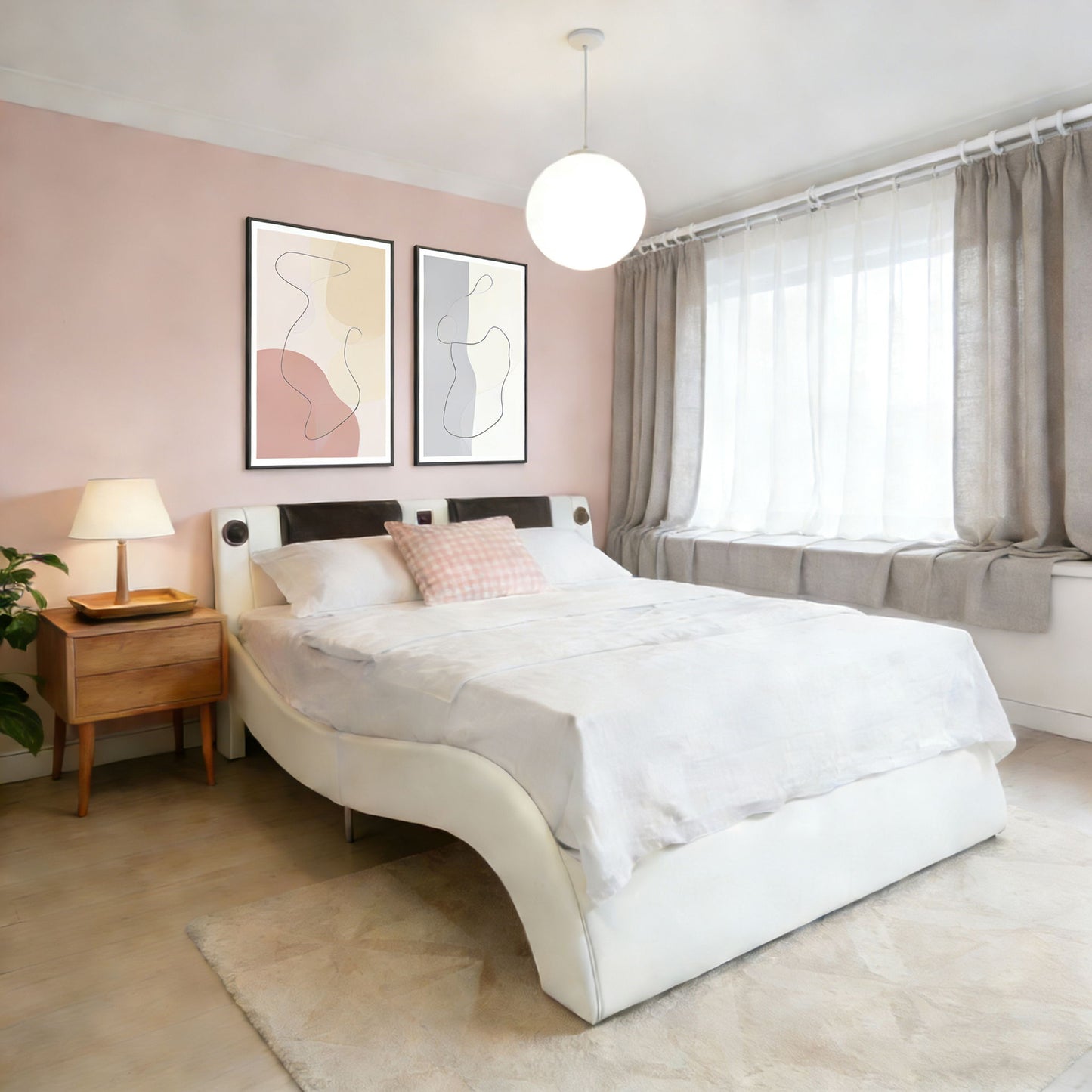 Platform upholstered bed frame in white faux leather with curved base and two abstract prints on Tampa Home & Garden Store