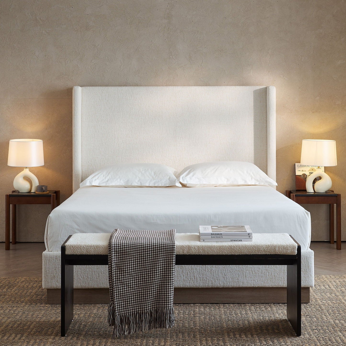 Hosford upholstered wingback bed in beige fabric with dark wood legs; two lamps on Tampa Home & Garden Store